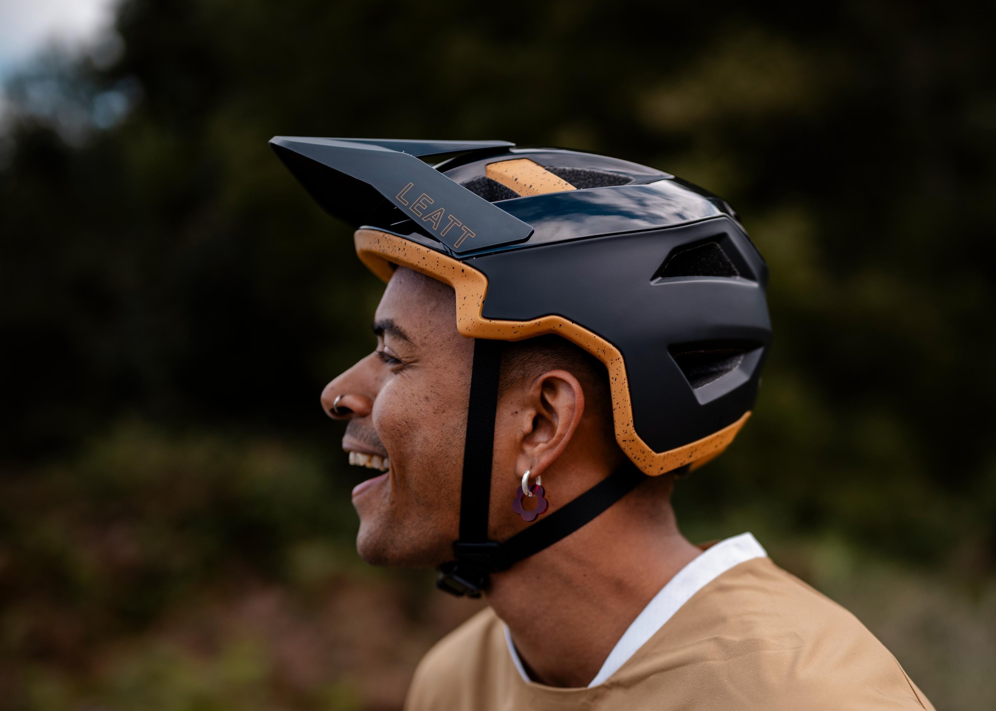 Mountain bike rider in black helmet